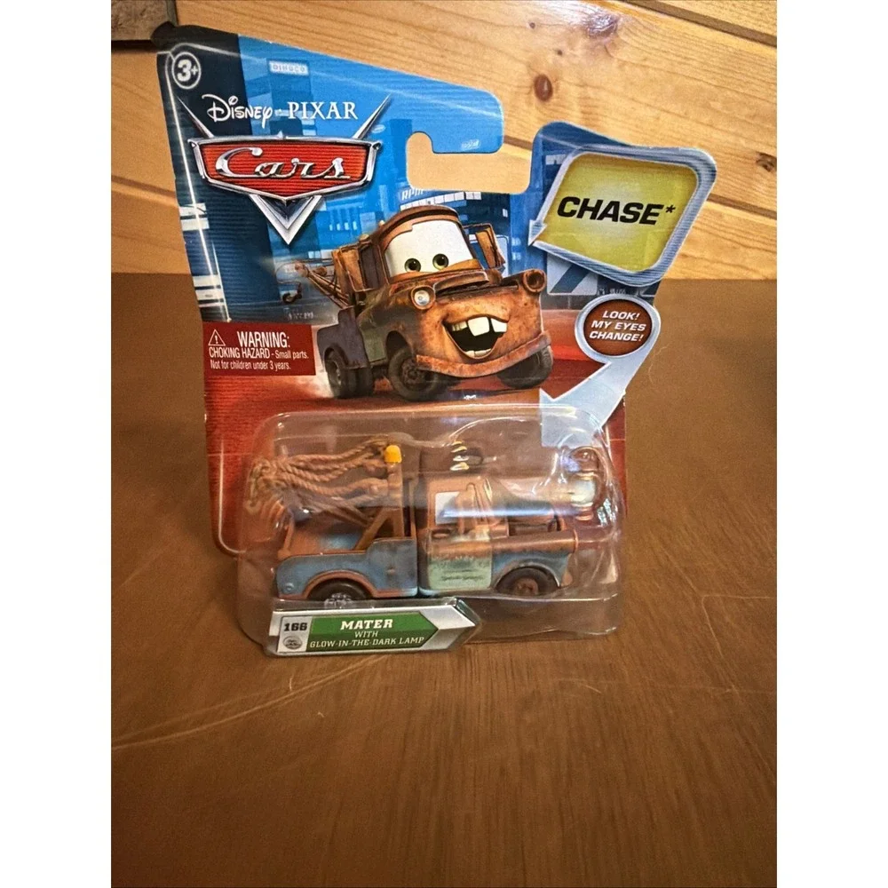 2010 Disney Pixar Cars Chase Mater #166 with Glow-In-The-Dark Lamp New ON CARD